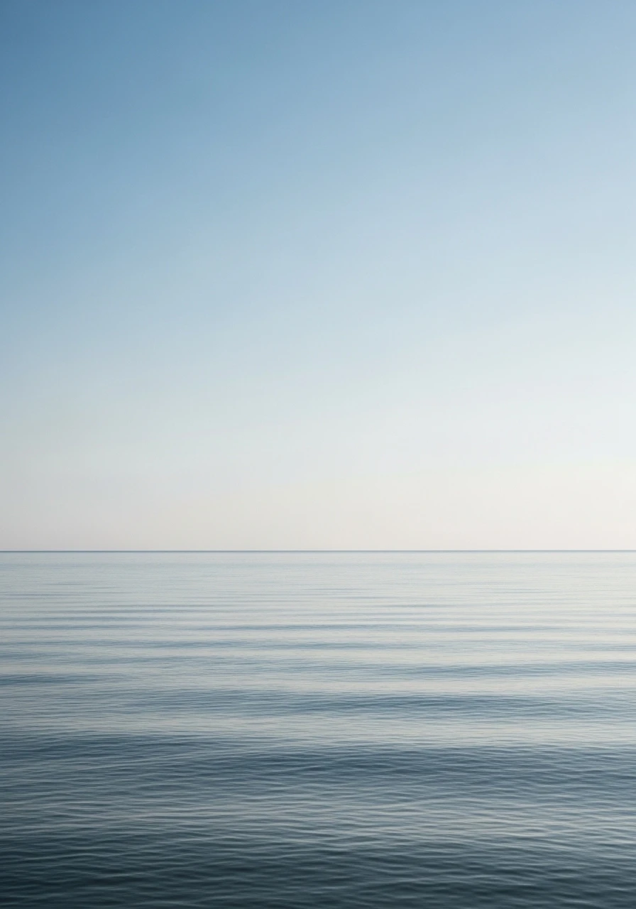 Calm blue ocean ripples under a clear sky
