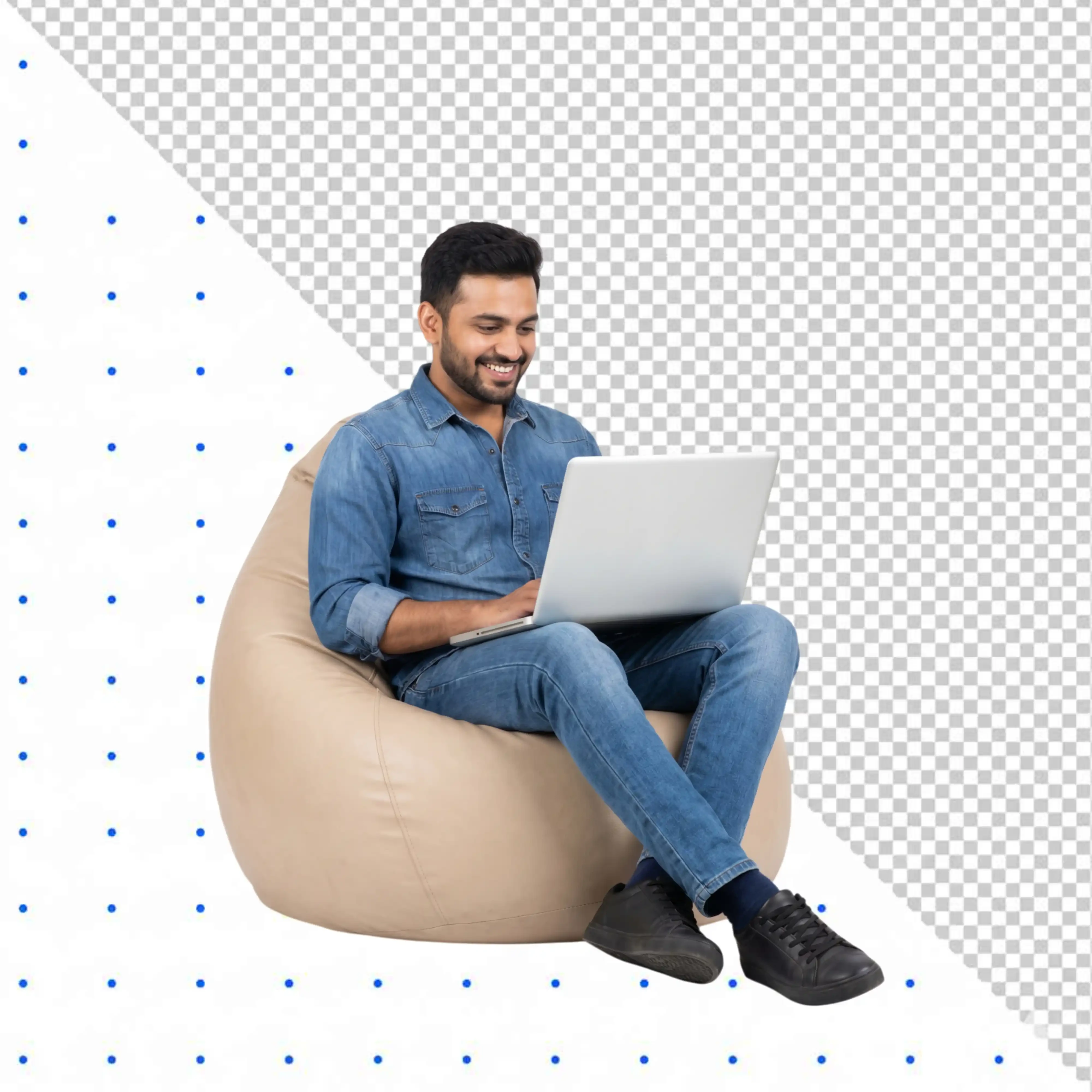 Happy man using laptop sitting on a bean bag PNG Transparent Background
