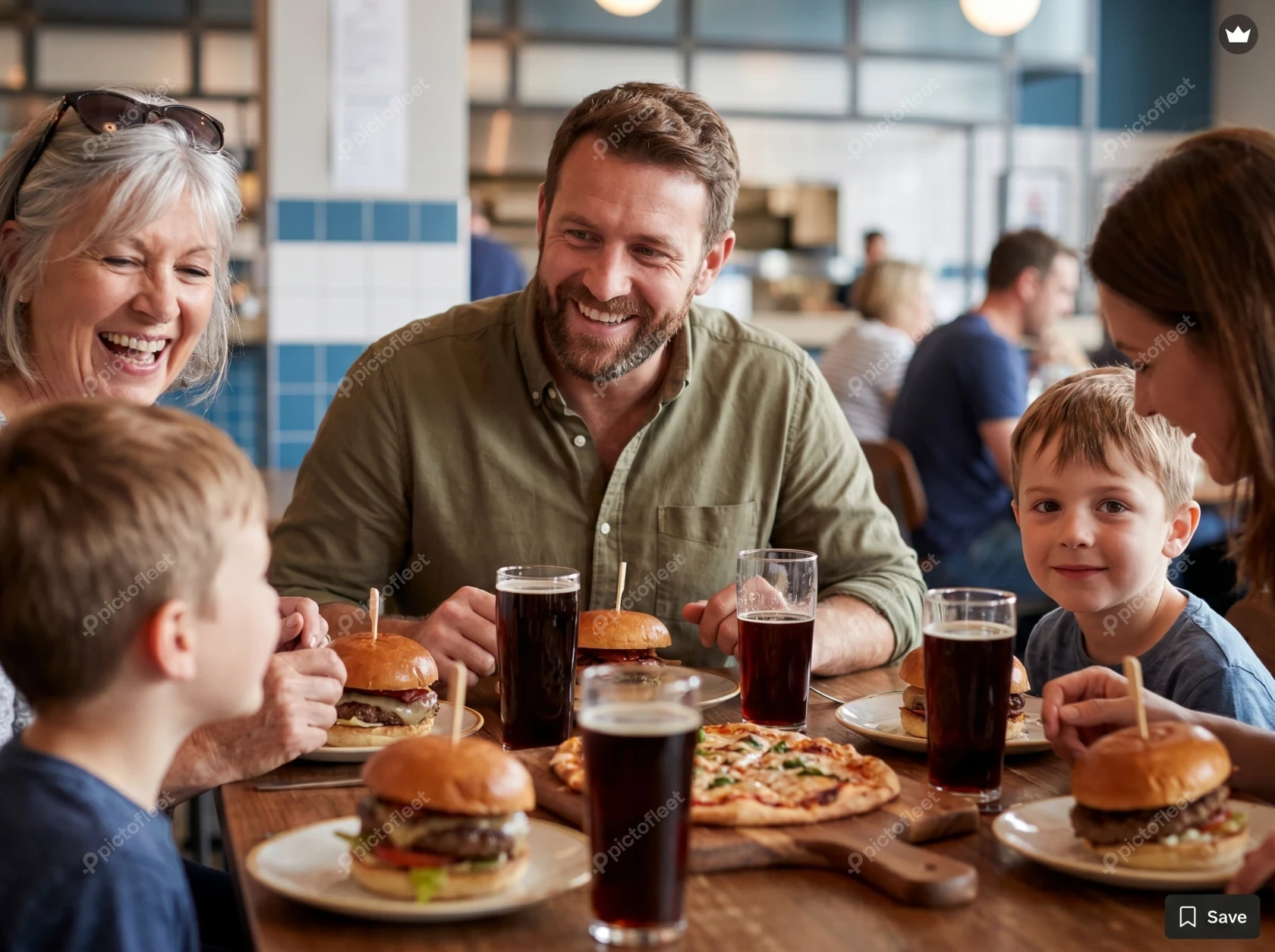 Multi-generational family enjoying a meal at a restaurant