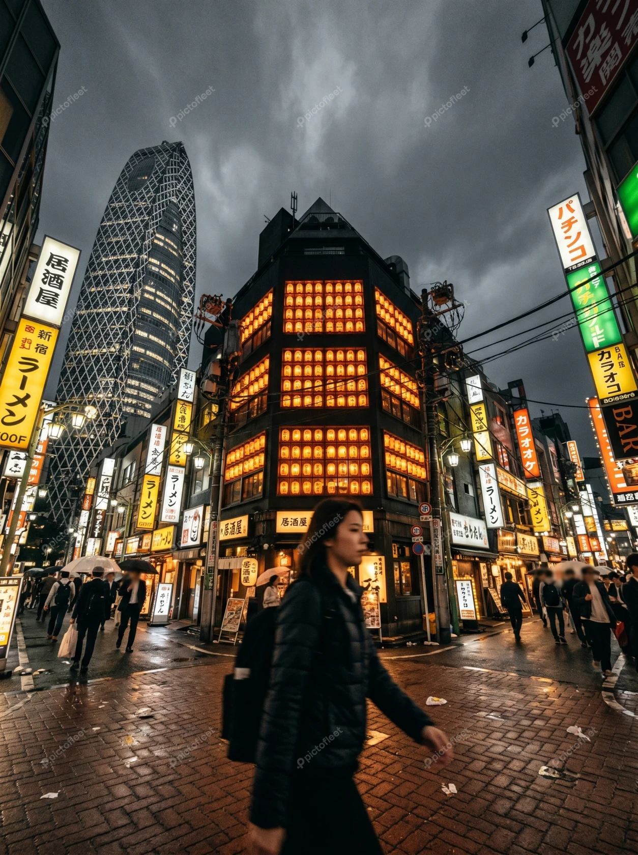 Woman walking through neon-lit streets of Shinjuku at night