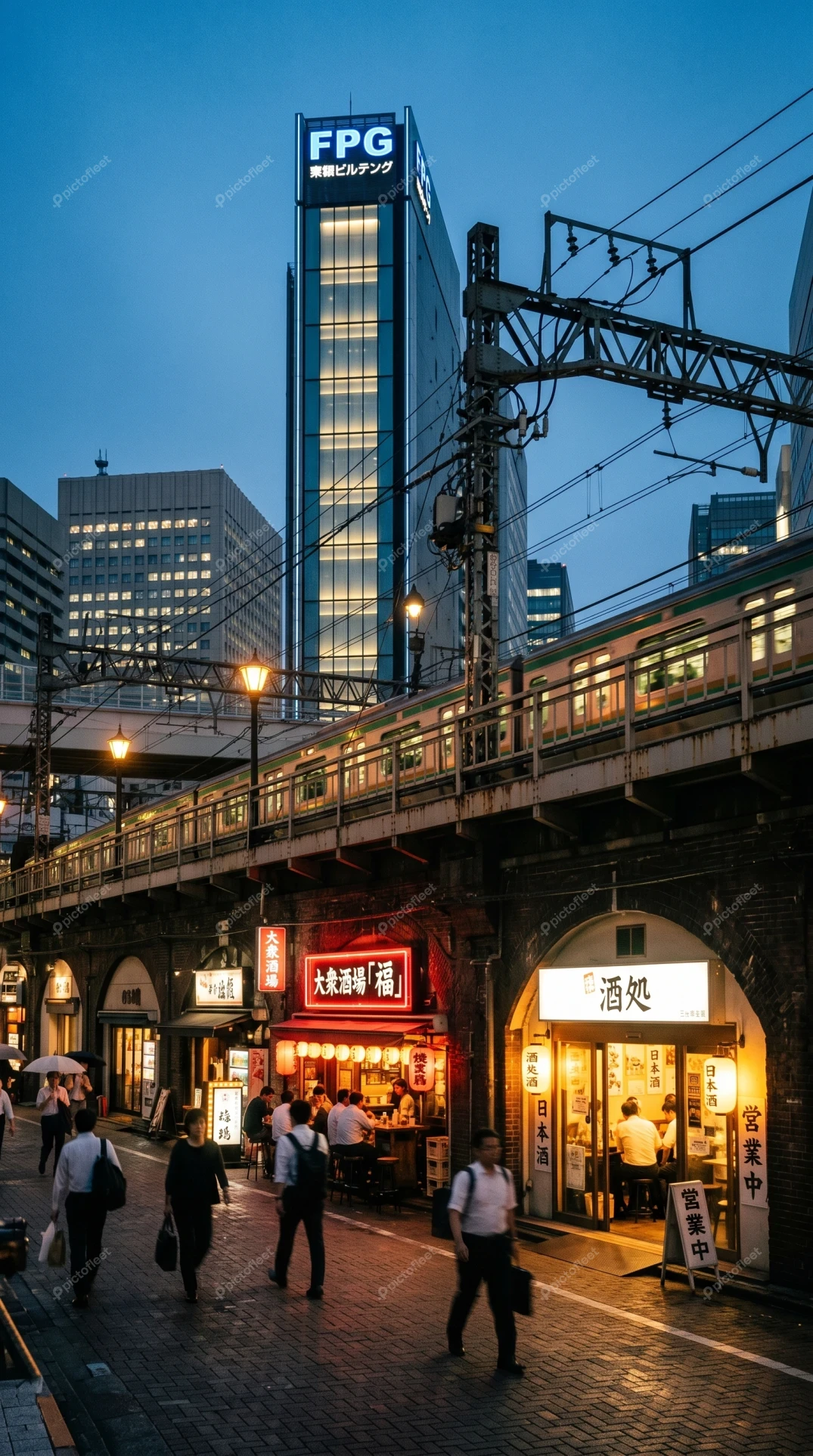 Bustling Tokyo street life under elevated railway tracks at night