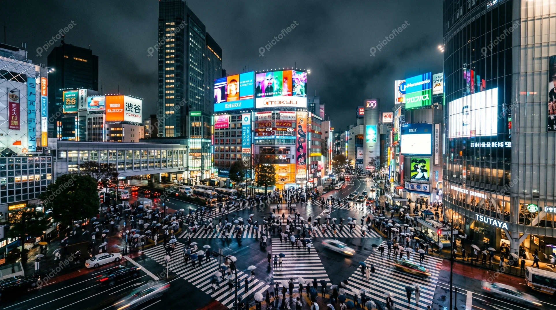 Shibuya Crossing in Tokyo at night with neon lights