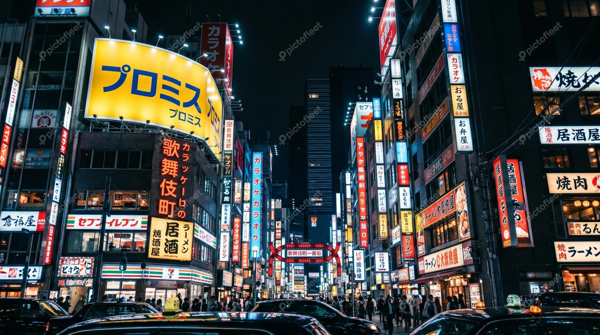 Busy Tokyo street with vibrant neon signs at night