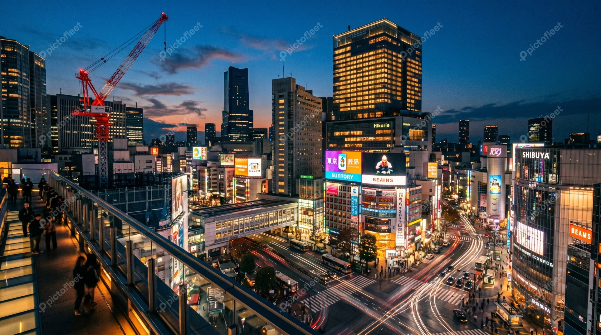 Shibuya crossing and cityscape at night in Tokyo Japan