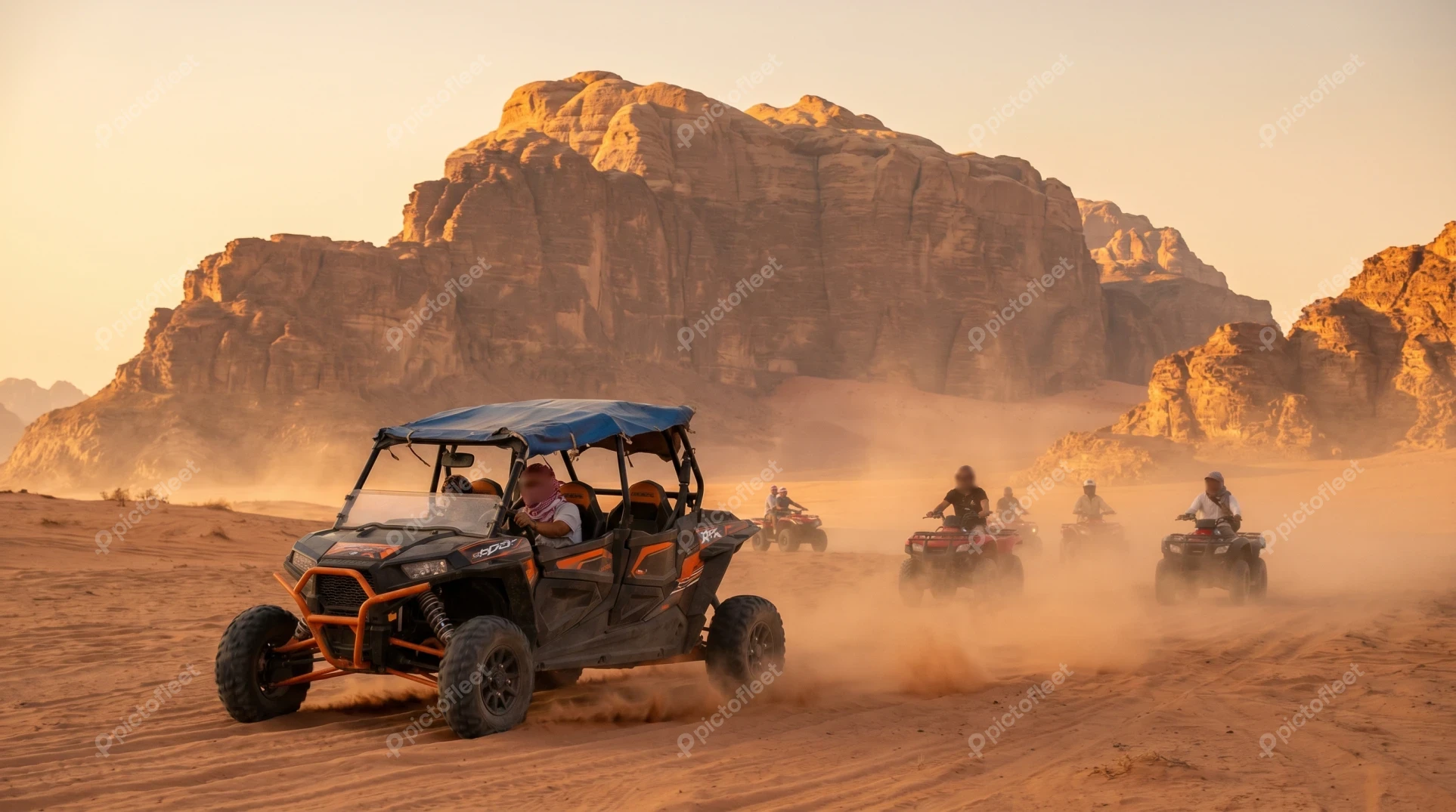 Off-road buggy and ATV safari in the desert dunes