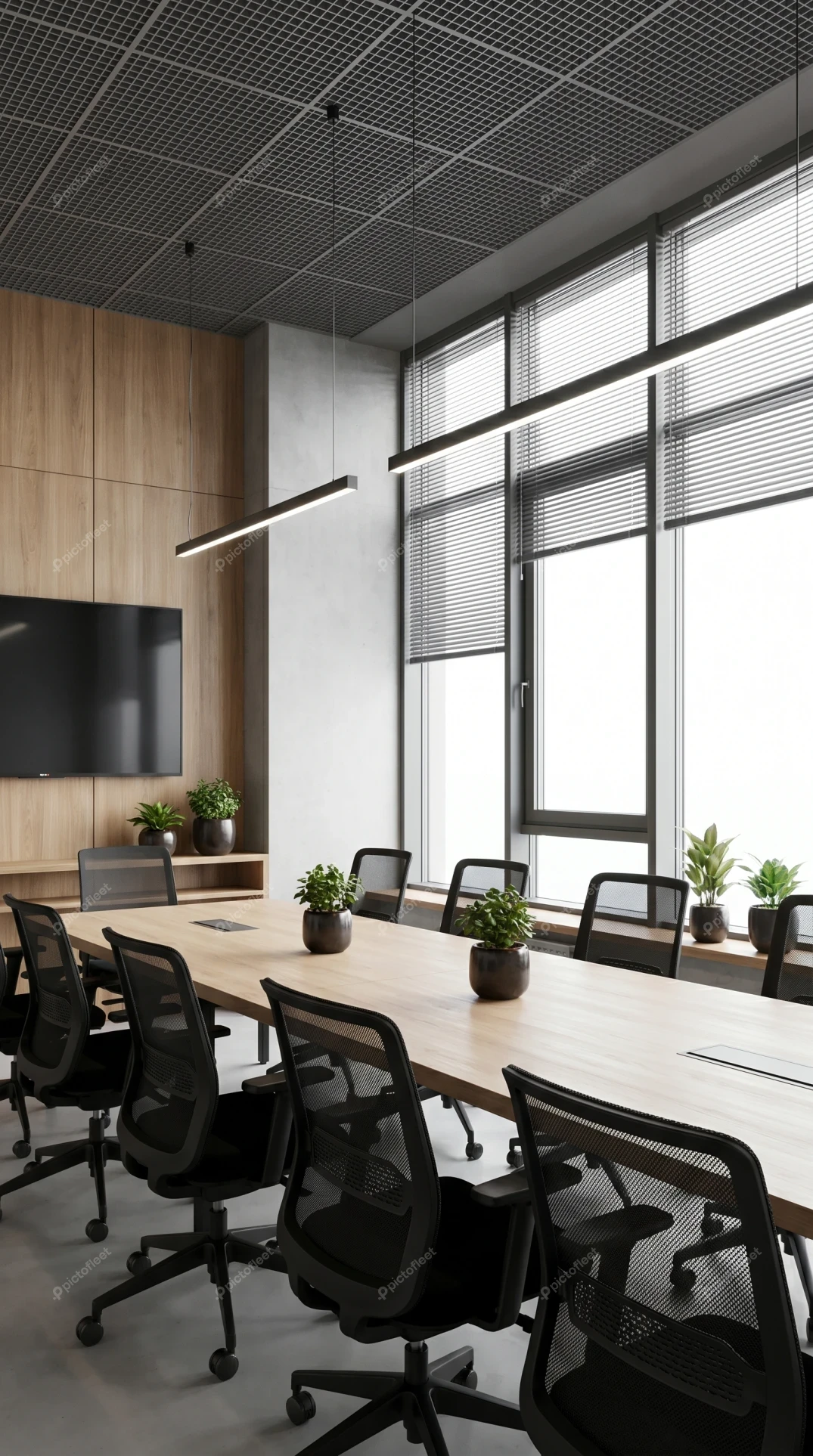 Modern conference room with wooden table and mesh chairs