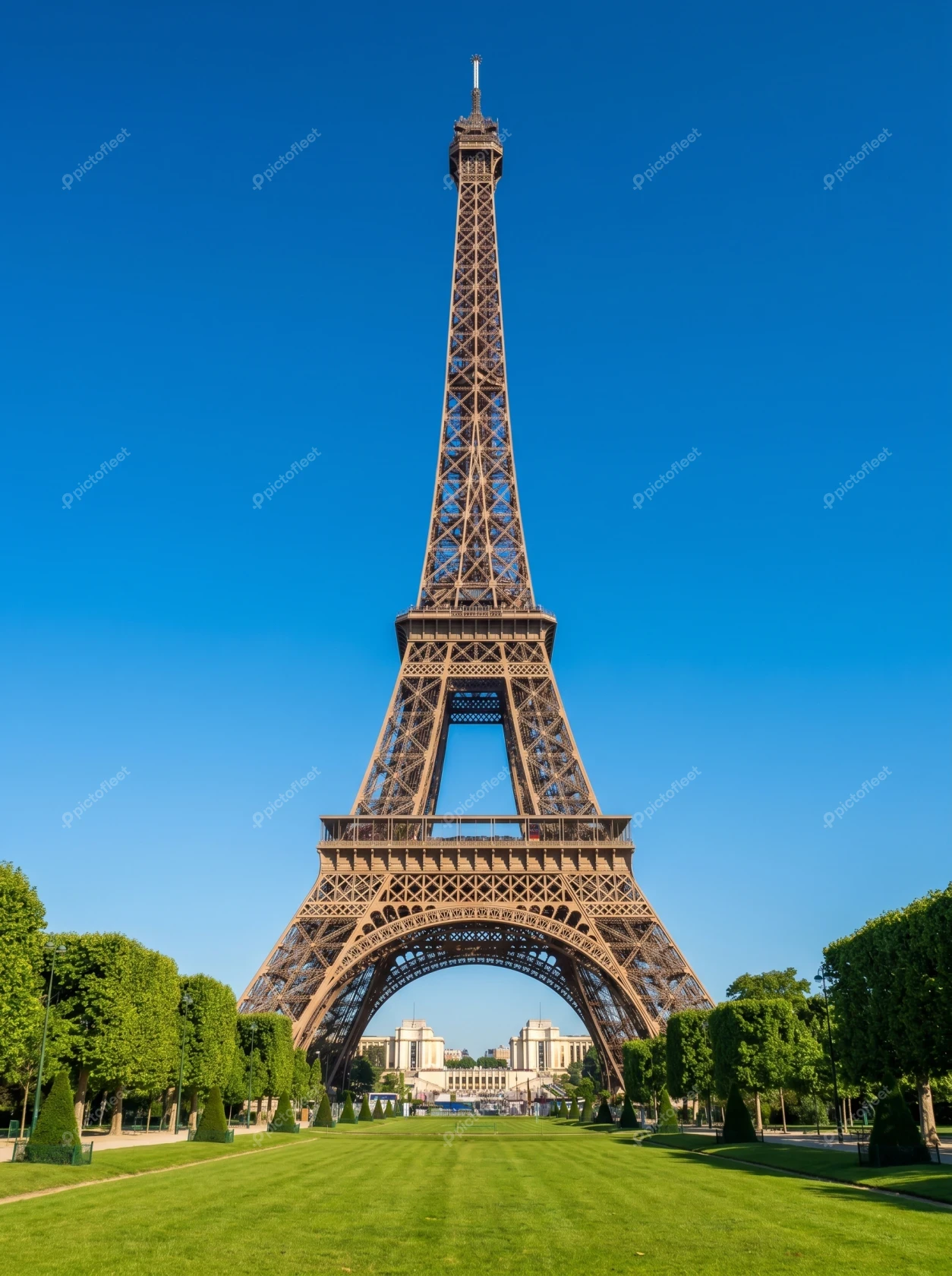 The Eiffel Tower in Paris under a clear blue sky