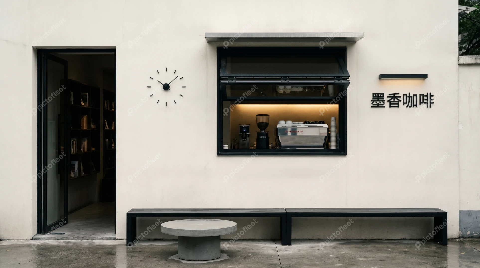 Minimalist modern coffee shop exterior with outdoor bench seating